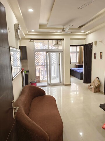 Living Room in 2 BHK Apartment at Amrapali Princely Estate, Sector 76 – for Sale