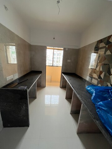 Kitchen in 2 BHK Apartment at TCJ Kings Court, Tawri Pada – for Sale