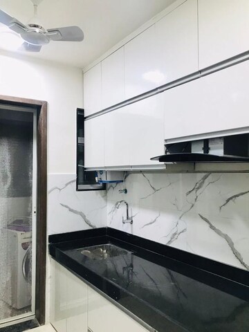 Kitchen in 3 BHK Apartment at Karia Konark Meadows, Wagholi – for Sale