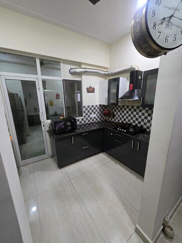 Kitchen in 2 BHK Apartment at Amaatra Homes, Sector 10 Greater Noida – for Sale