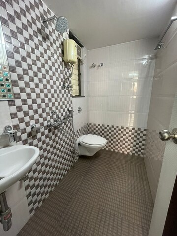 Bathroom in 1 BHK Apartment at Heena Presidency, Mira Road – for Sale