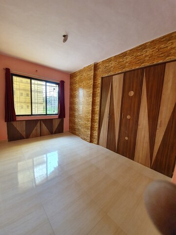 Bedroom in 1 BHK Apartment at Jai Pragati CHS, Dombivli West – for Sale