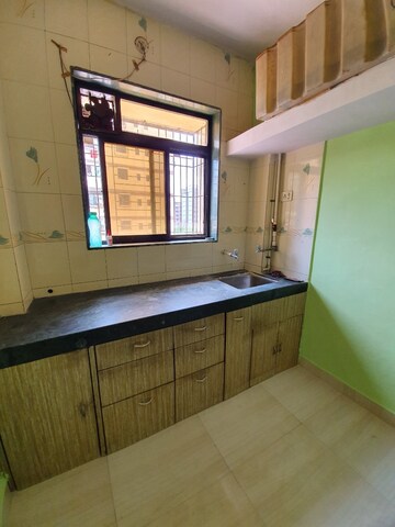 Kitchen in 1 BHK Apartment at Jai Pragati CHS, Dombivli West – for Sale