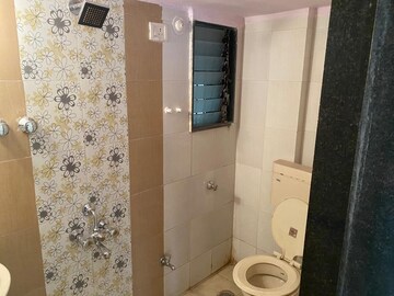 Bathroom in 1 BHK Apartment at Jai Pragati CHS, Dombivli West – for Sale