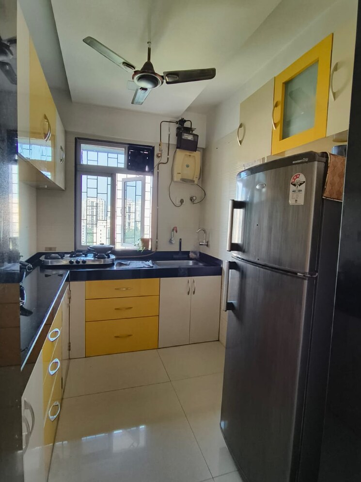 Kitchen, cosmos-classique 1 Bedroom 427 Sq.Ft. Apartment In Ghodbunder Road Thane 7401776