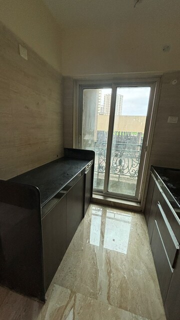Kitchen in 1 BHK Apartment at Siddhi Highland Springs, Dhokali – for Sale