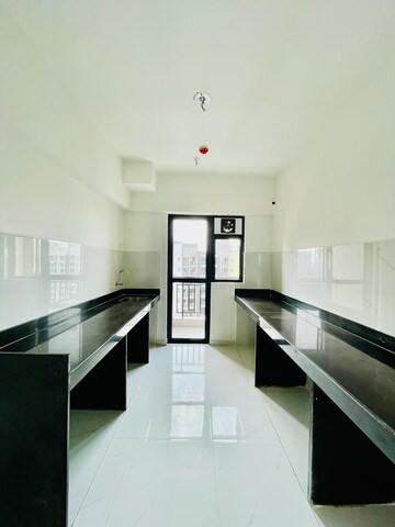 Kitchen in 3 BHK Apartment at Runwal Gardens, Dombivli East – for Sale