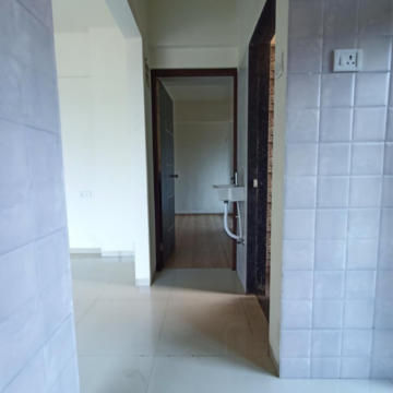 Building Lobby in 2 BHK Apartment at Mahaavir Heights, Kalamboli Sector 16 – for Sale