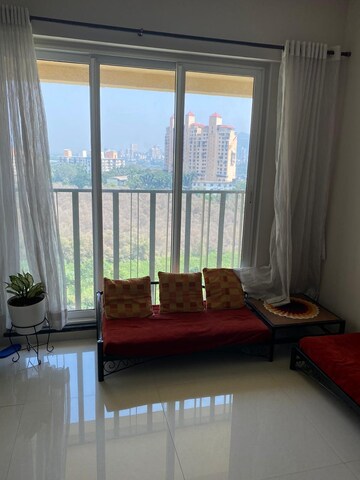 Living Room in 2 BHK Apartment at Rustomjee Urbania Acura, Majiwada – for Sale