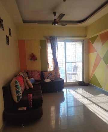 Living Room in 1 BHK Apartment at Rosa Elite, Bhayandarpada – for Sale