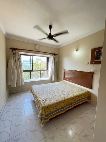 Bedroom in 2 BHK Apartment at Lokhandwala Riviera Tower, Kandivali East – for Sale
