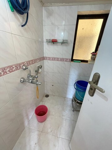 Master Bedroom in 2 BHK Apartment at Lokhandwala Riviera Tower, Kandivali East – for Sale
