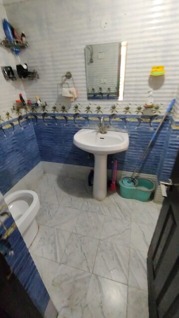 Bathroom in 2 BHK Apartment at Bulland Heights, Sain Vihar – for Sale