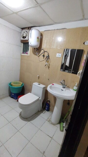 Bathroom in 2 BHK Apartment at Bulland Heights, Sain Vihar – for Sale