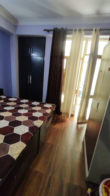 Bedroom in 2 BHK Apartment at Bulland Heights, Sain Vihar – for Sale