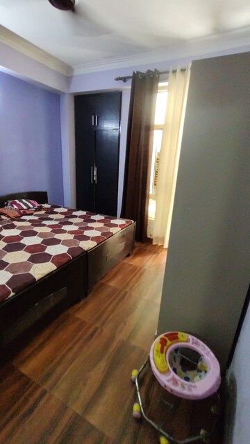 Bedroom in 2 BHK Apartment at Bulland Heights, Sain Vihar – for Sale