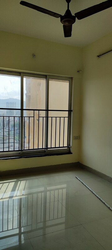 Room in 2 BHK Apartment at Rustomjee Urbania Atelier, Majiwada – for Sale