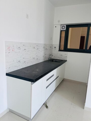 Kitchen in 2 BHK Apartment at Amanora Gold Towers, Hadapsar – for Sale