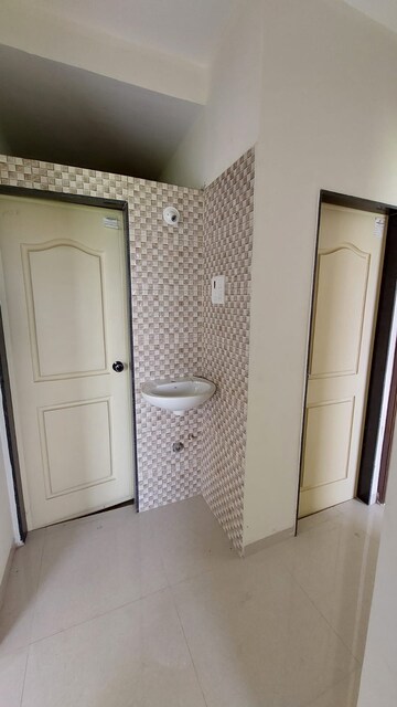 Bathroom in 1 BHK Apartment at Panvelkar Amrut Towers, Badlapur West – for Sale