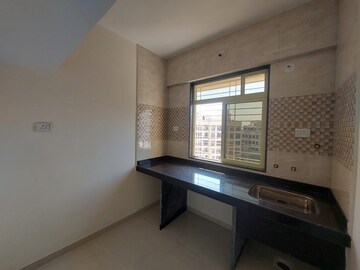 Kitchen in 1 BHK Apartment at Panvelkar Amrut Towers, Badlapur West – for Sale