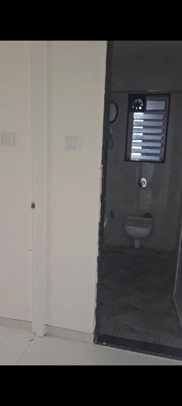 Bathroom in 2 BHK Apartment at Omkar CHS Mulund, Mulund East – for Sale