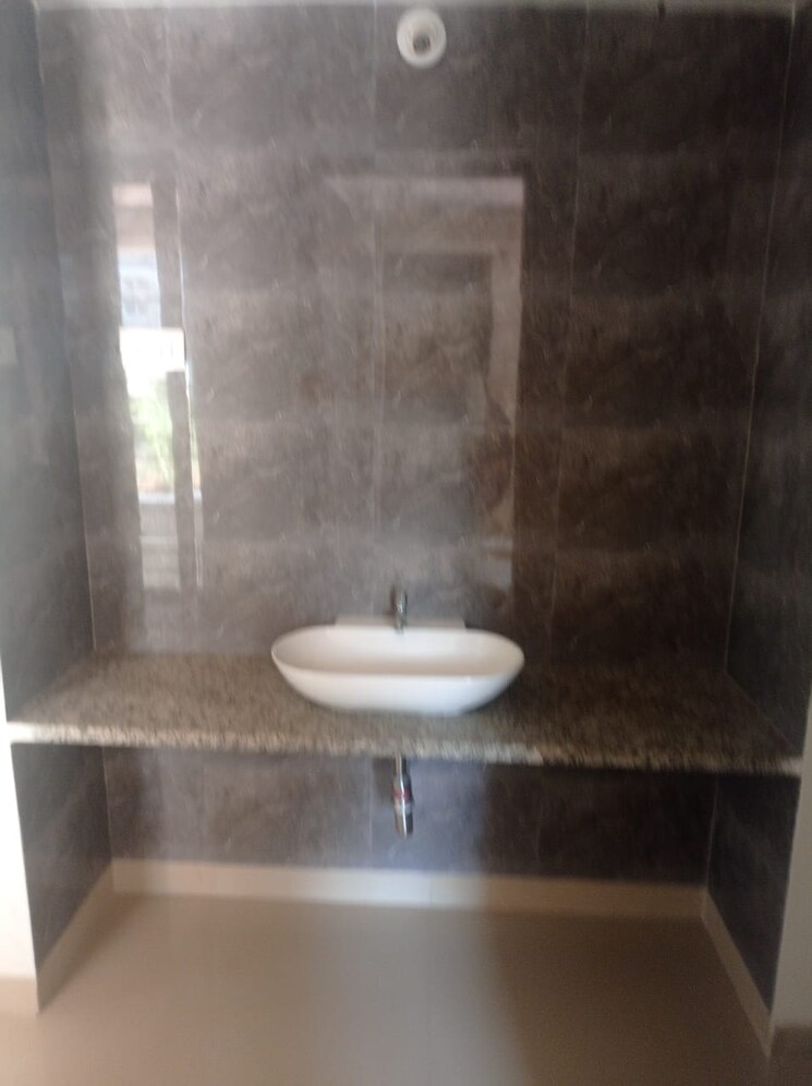 Bathroom, solitaire-premier-tower 2 Bedroom 900 Sq.Ft. Apartment In Bibwewadi Pune 7407993