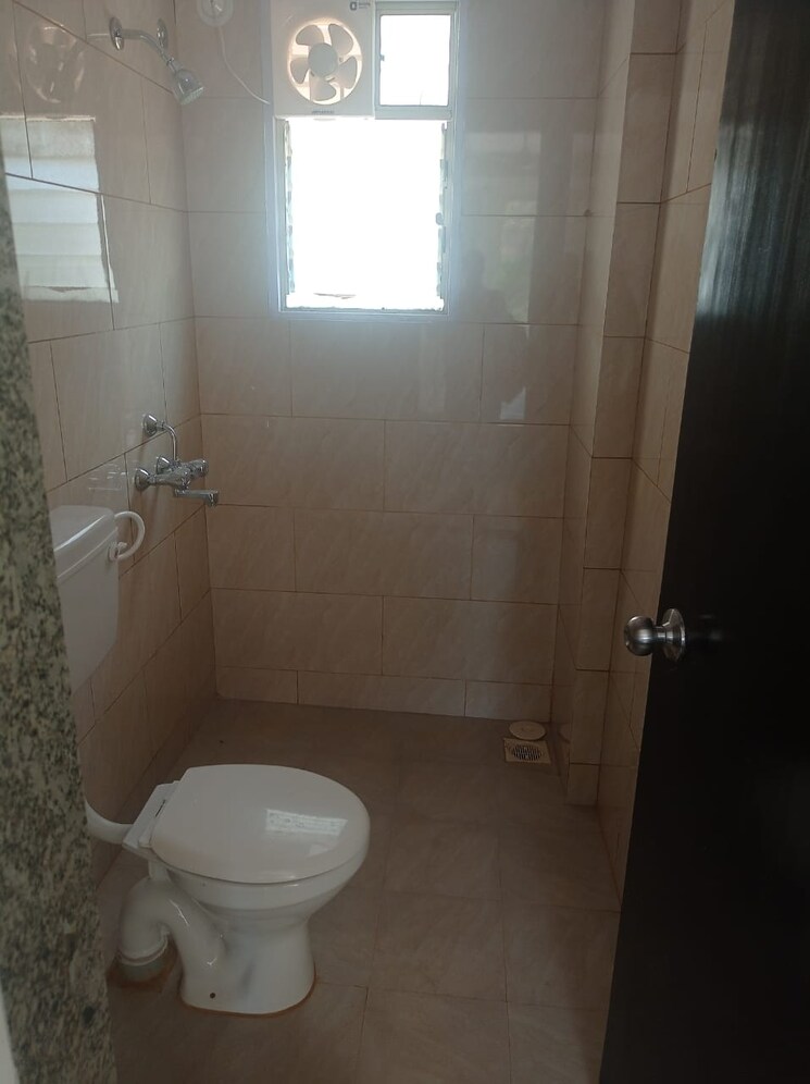 Bathroom, solitaire-premier-tower 2 Bedroom 900 Sq.Ft. Apartment In Bibwewadi Pune 7407993
