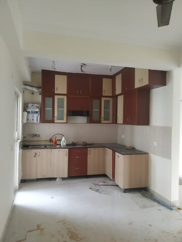 Kitchen in 2 BHK Apartment at Aims Golf City, Sector 75 – for Sale