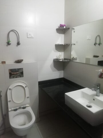 Bathroom in 2 BHK Apartment at Aims Golf City, Sector 75 – for Sale