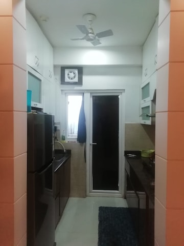Kitchen in 2 BHK Apartment at Aims Golf City, Sector 75 – for Sale