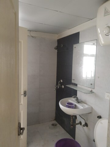 Bathroom in 2 BHK Apartment at Gardenia Golf City, Sector 75 – for Sale