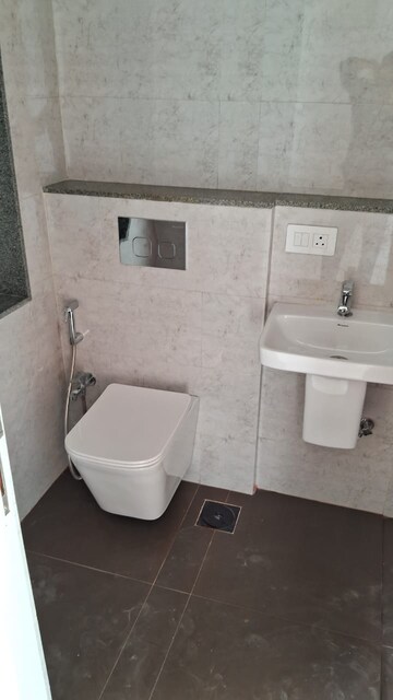 Bathroom in 1 BHK Apartment at MICL Aaradhya Prime Park, Mira Road – for Sale