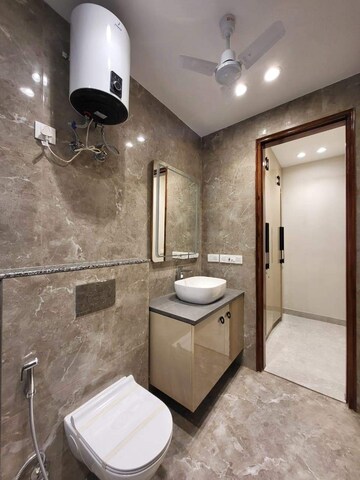 Bathroom in 3 BHK Builder Floor at Ansal API Esencia, Sector 67 – for Sale