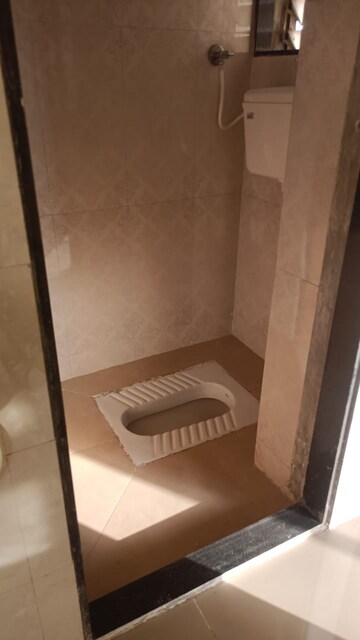 Bathroom in 1 BHK Apartment at Frenny Platinum Tower, Vasai East – for Sale