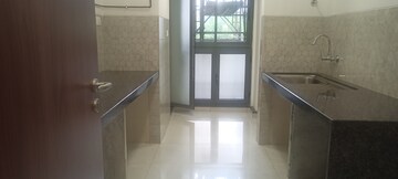 Kitchen in 1 BHK Apartment at DGS Sheetal Tapovan, Malad East – for Sale