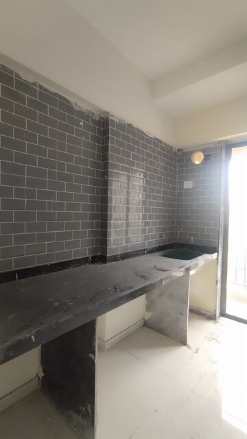 Kitchen in 1 BHK Apartment at Raunak City Sector 4, Kalyan West – for Sale