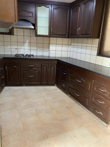 Kitchen in 4 BHK Apartment at Unitech Uniworld Gardens, Sector 47 – for Sale