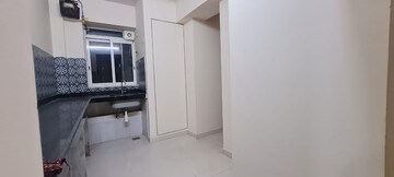 Kitchen in 2 BHK Apartment at Lodha Amara, Kolshet Road – for Sale