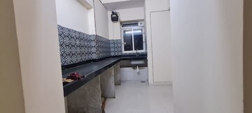 Kitchen in 2 BHK Apartment at Lodha Amara, Kolshet Road – for Sale