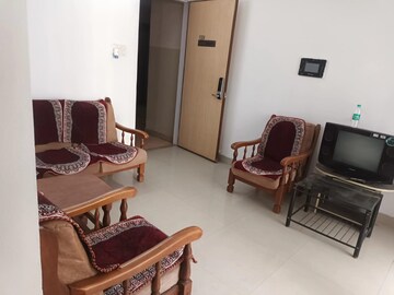 Living Room in 1 BHK Apartment at Magarpatta City Heliconia, Hadapsar – for Sale