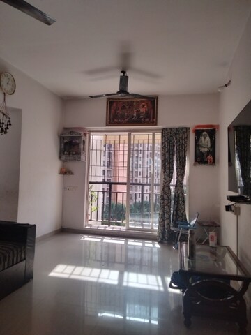 Living Room in 1 BHK Apartment at Rosa Gardenia, Ghodbunder Road – for Sale