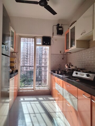 Kitchen in 1 BHK Apartment at Rosa Gardenia, Ghodbunder Road – for Sale
