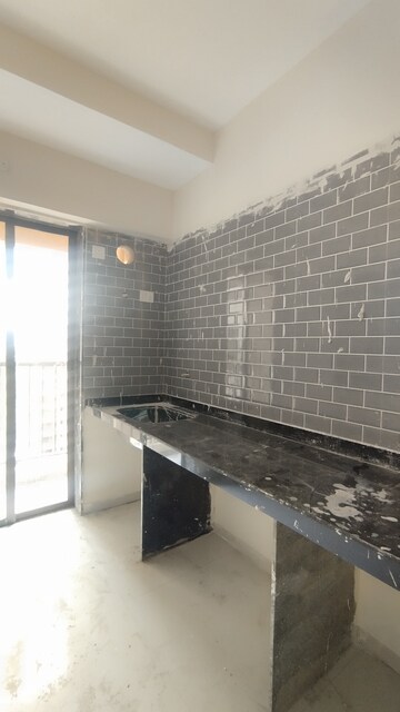 Kitchen in 1 BHK Apartment at Raunak City Sector 4, Kalyan West – for Sale