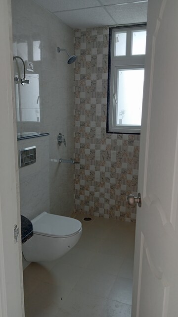 Bathroom in 3 BHK Builder Floor at Chandra Panorama, Sushant Golf City – for Sale
