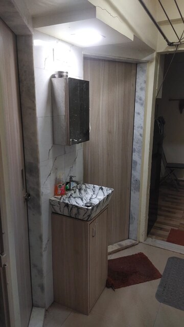 Bathroom in 2.5 BHK Apartment at Mahesh Tower, Andheri West – for Sale