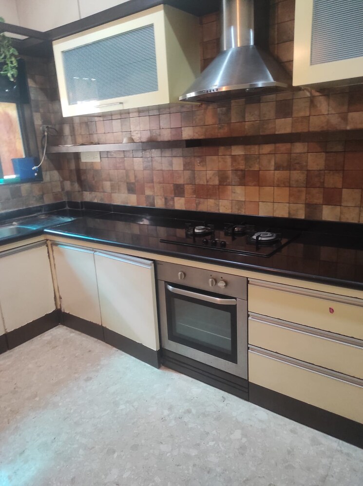 Kitchen, dorabjee-paradise-building-a-b-condominium 4 Bedroom 5000 Sq.Ft. Villa In Mohammadwadi Pune 7413387