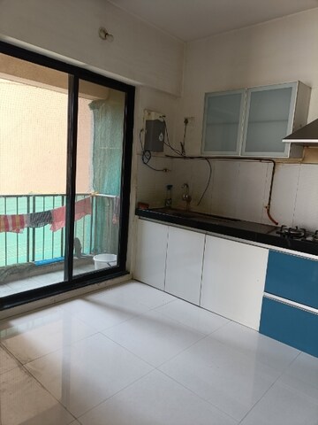 Kitchen in 2 BHK Apartment at Pride World City Long Island, Charholi Budruk – for Sale