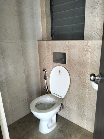 Bathroom in 1 BHK Apartment at Shapoorji Pallonji Joyville Palm Meadows, Virar West – for Sale