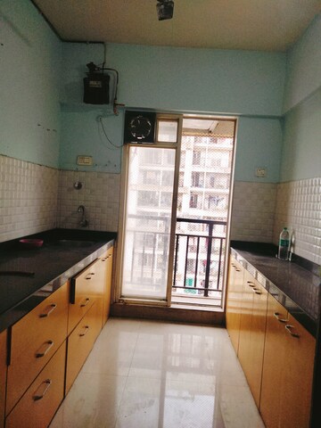 Kitchen in 1.5 BHK Apartment at Rosa Gardenia, Ghodbunder Road – for Sale