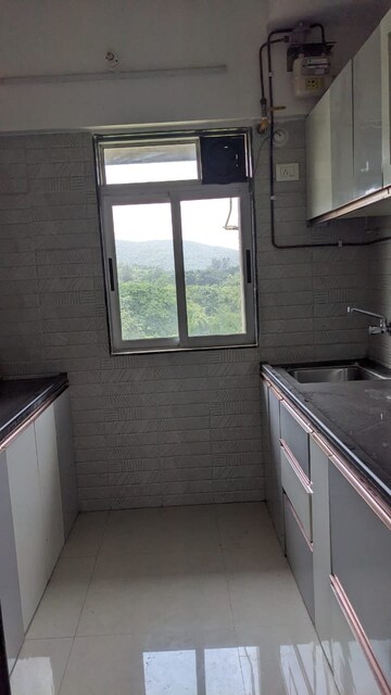 Kitchen in 1 BHK Apartment at Vihang Valley Phase 3, Kasarvadavali – for Sale
